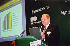 Franz Ehrhardt speaking to a group about retail marketing.